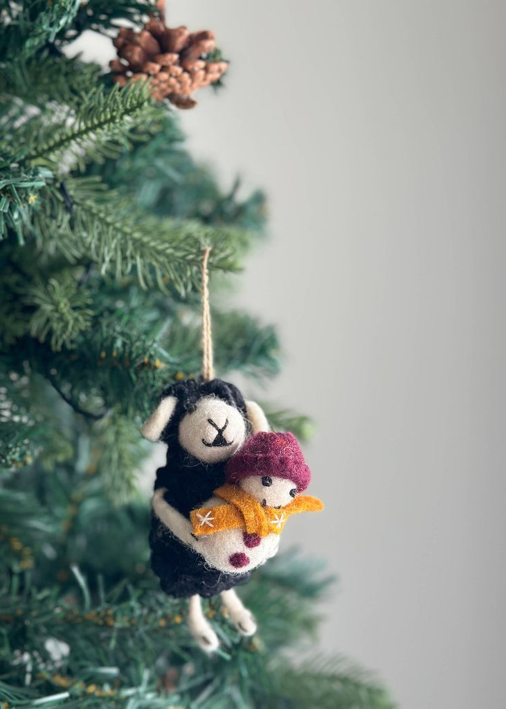 Deer Harbour Design | Sheep Holding Snowman Ornament