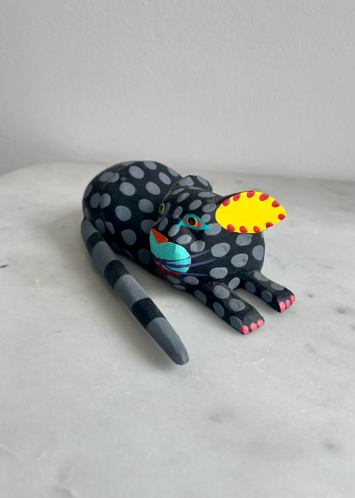 Eduardo Jimenez | Black Cat Lying Down