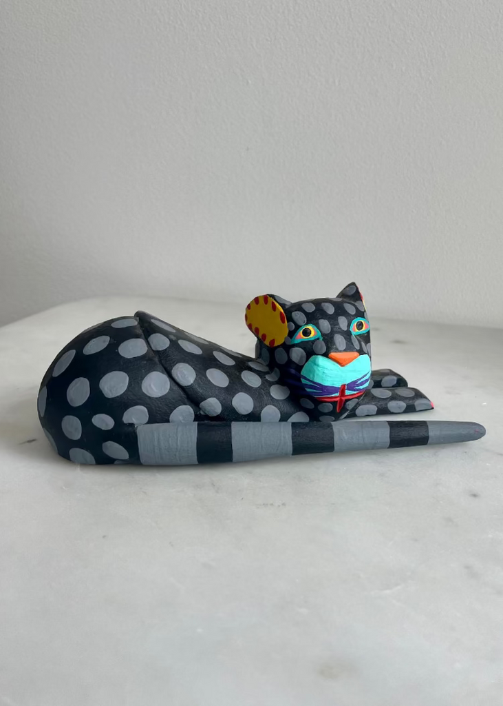 Eduardo Jimenez | Black Cat Lying Down
