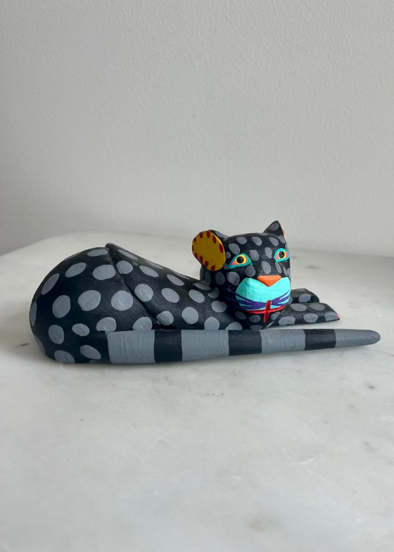 Eduardo Jimenez | Black Cat Lying Down