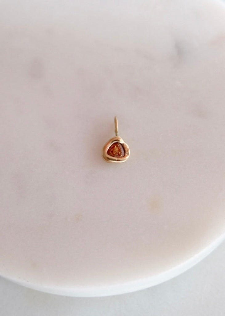 Occasionally Sweet | 14kg Nugget Charm | Red Sapphire
