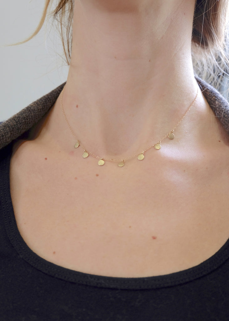 14k Gold Seven Disc Necklace Modeled
